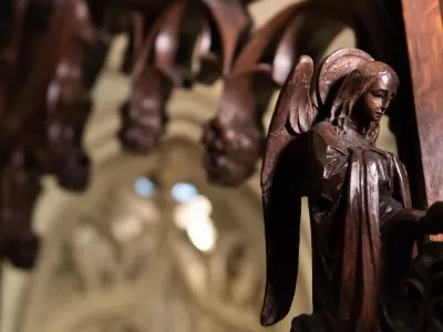 A wooden carving of an angel in the Chapel of All Saints at Trinity Church Wall Street
