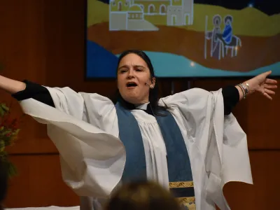 The Rev. Kristin Kaulbach Miles preaches at the Family Service during Advent.