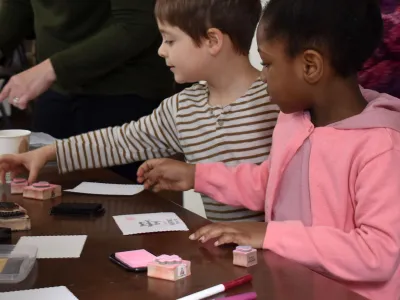 Children make handmade Valentine cards in St. Paul's Chapel during Whole Community Learning in early 2020