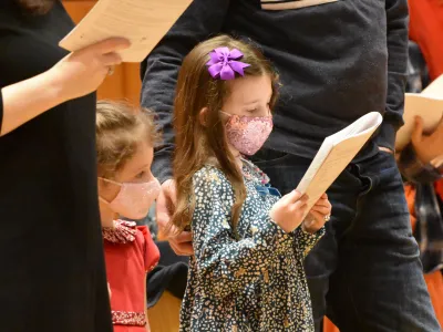 Children worshipping in Parish Hall