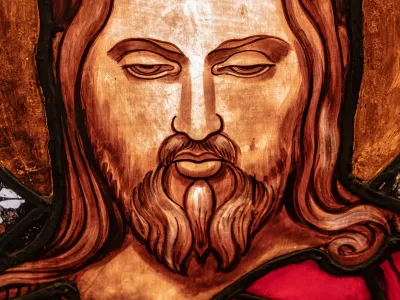 A stained glass depiction of Jesus