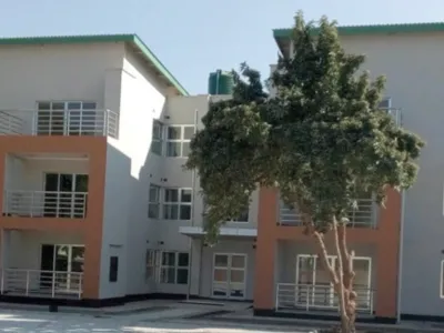 An exterior shot of the Selby Taylor Apartment Complex in Lusaka. Anglican