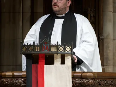 Father Matt in the pulpit