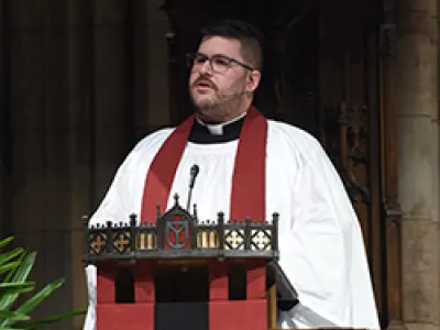 The Rev. Matt Welsch preaches in Trinity Church
