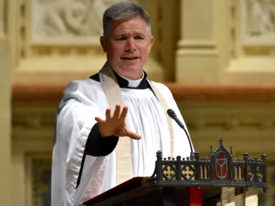 Father Bird in the pulpit