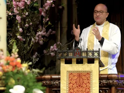 Father Phil in the pulpit