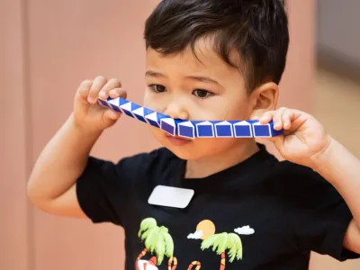 A child plays during Children's Time at Trinity Commons