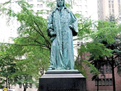 Sculpture of John Watts, Jr. in Trinity Churchyard