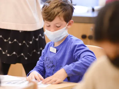 A child works on a project in Children's Time