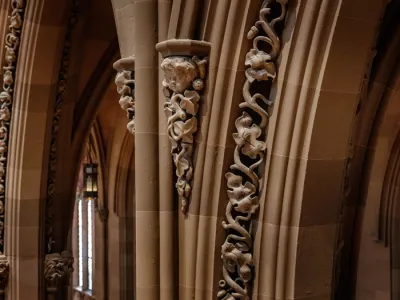 A close-up of shadowy arches in Trinity Church