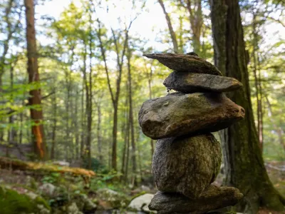 A stack of rocks alongside a stream in Trinity Forest