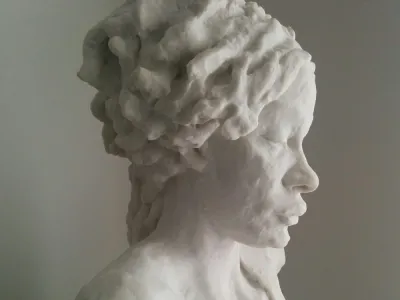 White statue of woman's head