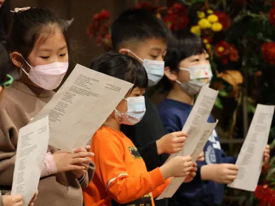 A children's choir singing during service at Trinity Church