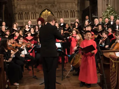 Stephen Sands directs choir for holiday concert