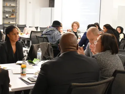 Racial Justice initiative staff and grantees speak in small groups during the November 2019 Racial Justice Grantee Convening.