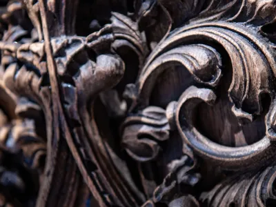 A close-up photo of wood carved into swirls in Trinity Church