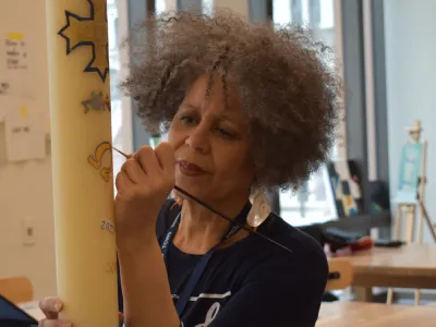 Toni Foy painted the candle