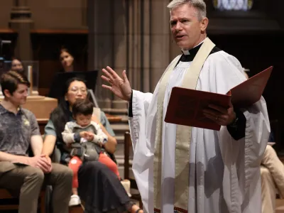 The Rev. Michael A. Bird preaches to families at the 9am service in Trinity Church.