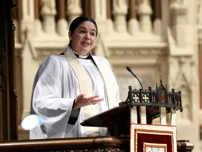 The Rev. Beth Blunt preaches at the pulpit at Trinity Church on June 4, 2023.