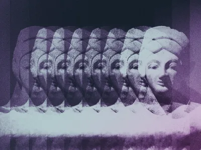 Purple image of a statue repeated