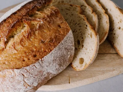 A sliced loaf of bread on a plate