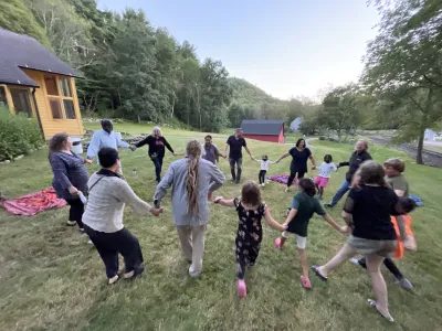Group of people on the grounds of TRC