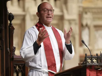 Father Phil in the pulpit