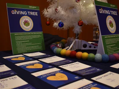 the Giving Tree in Trinity Commons with gift tags