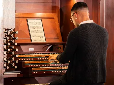 Man plays the organ at St. Paul's Chapel.