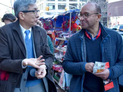 The Rev. Phillip A. Jackson, Rector of Trinity Church and Wellington Chen, the executive director of the Chinatown Partnership Local Development Corporation in New York City