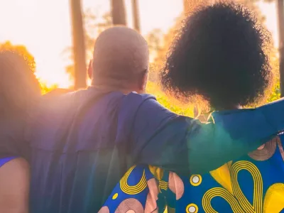 Three African American people face the sun