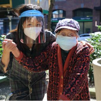 Yuetying Lee (right) and Sing Lam in the garden at St. Margaret’s House. 