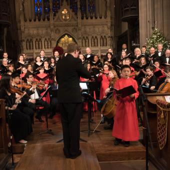 Stephen Sands directs choir for holiday concert