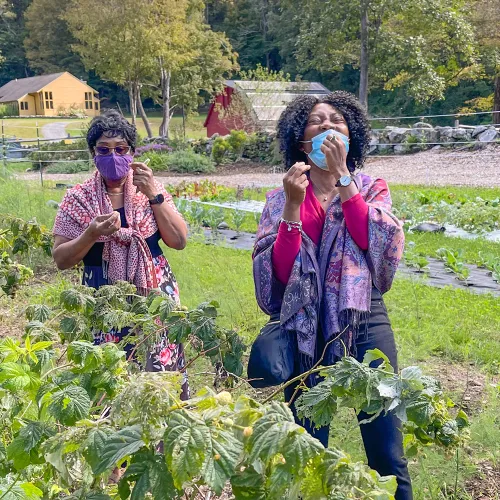 Two women in the Trinity Retreat Center farm