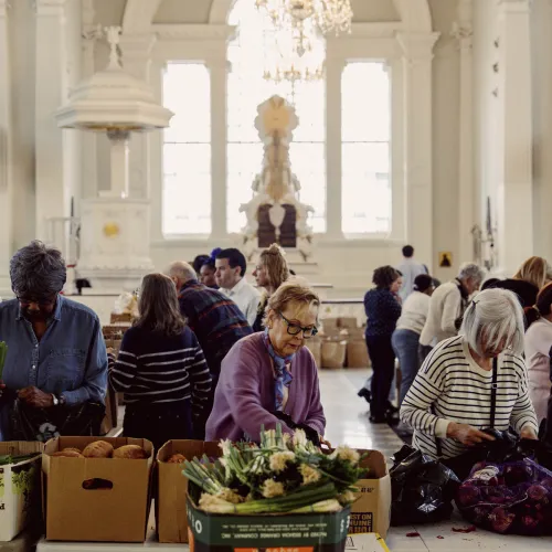 People pack groceries in St. Paul's Chapel.