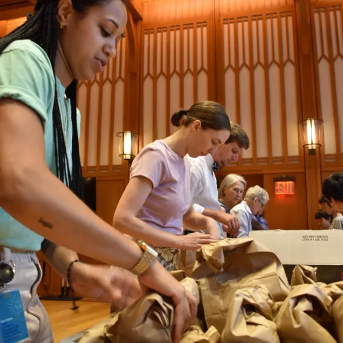 Trinity parishioners packing Compassion Meals for the Lower Manhattan community